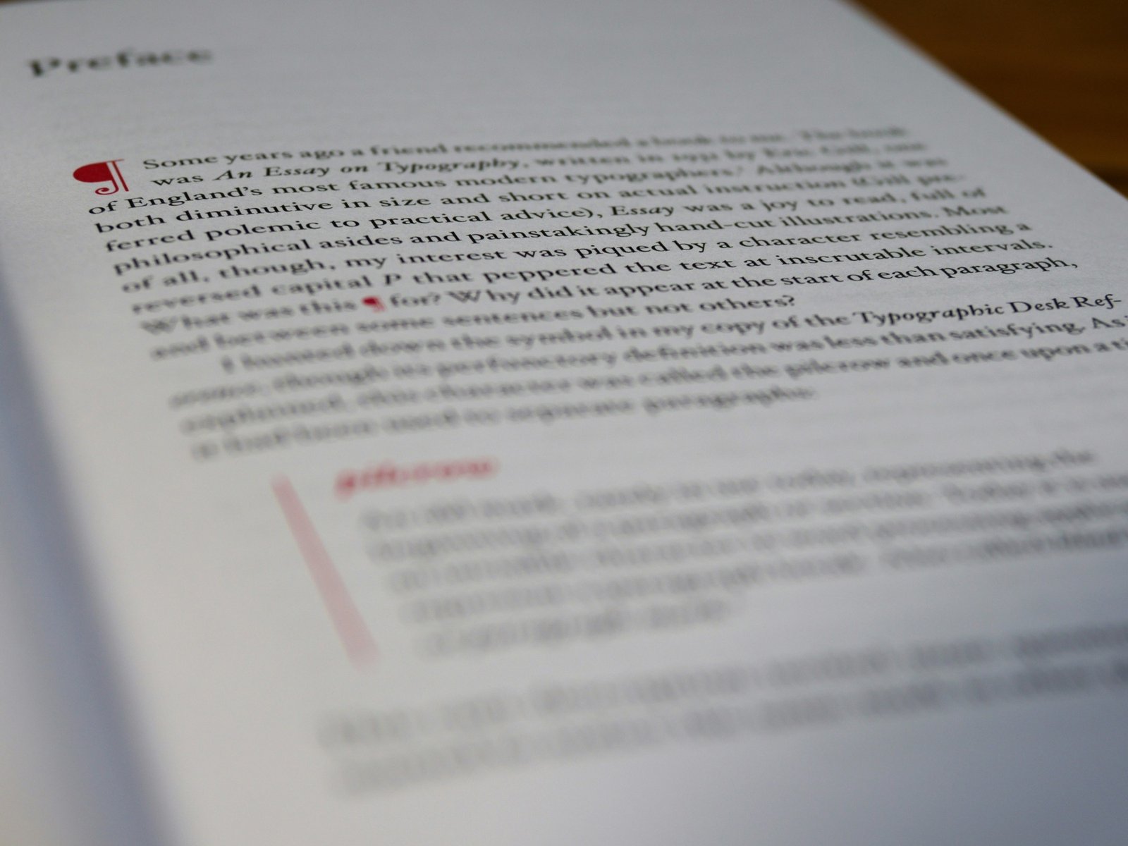 A close view of carefully typeset text representing copy-editing and proofreading